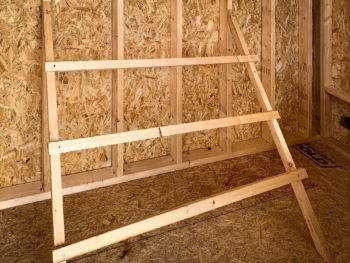 A roosting ladder in a chicken coop for sale in Tennessee