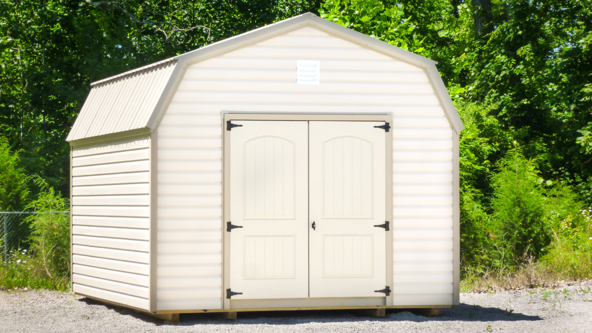 exterior of white barn shed for sale
