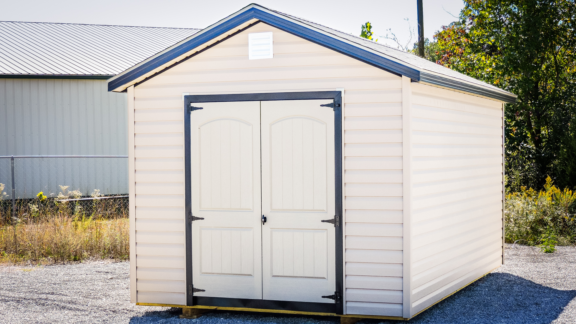 exterior of white ranch lawnmower shed for sale in KY